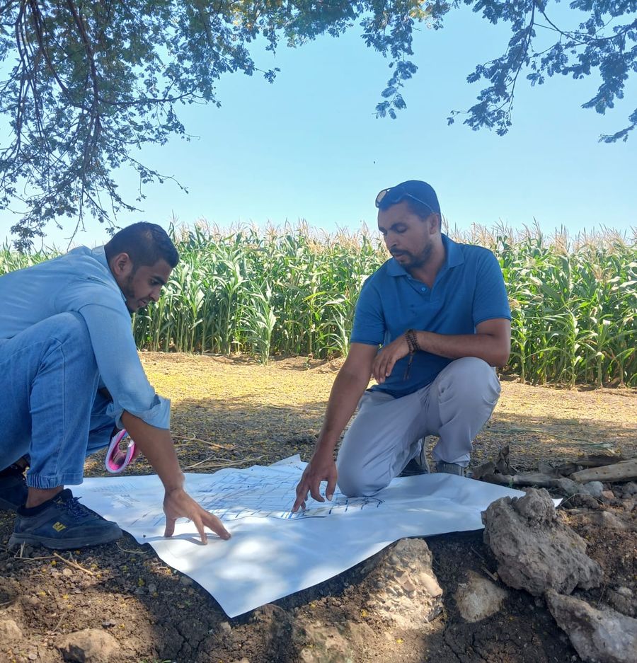 Sun Egypt Group engineers reviewing the network layout on site
